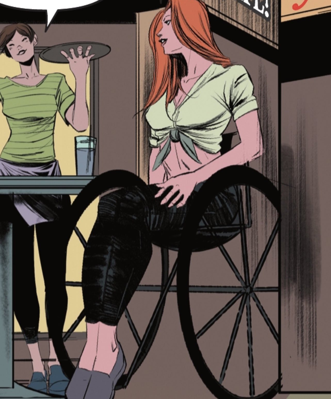 A screenshot from a DC comic featuring Bat Girl in a manual wheelchair whose footrest is so small it is invisible.