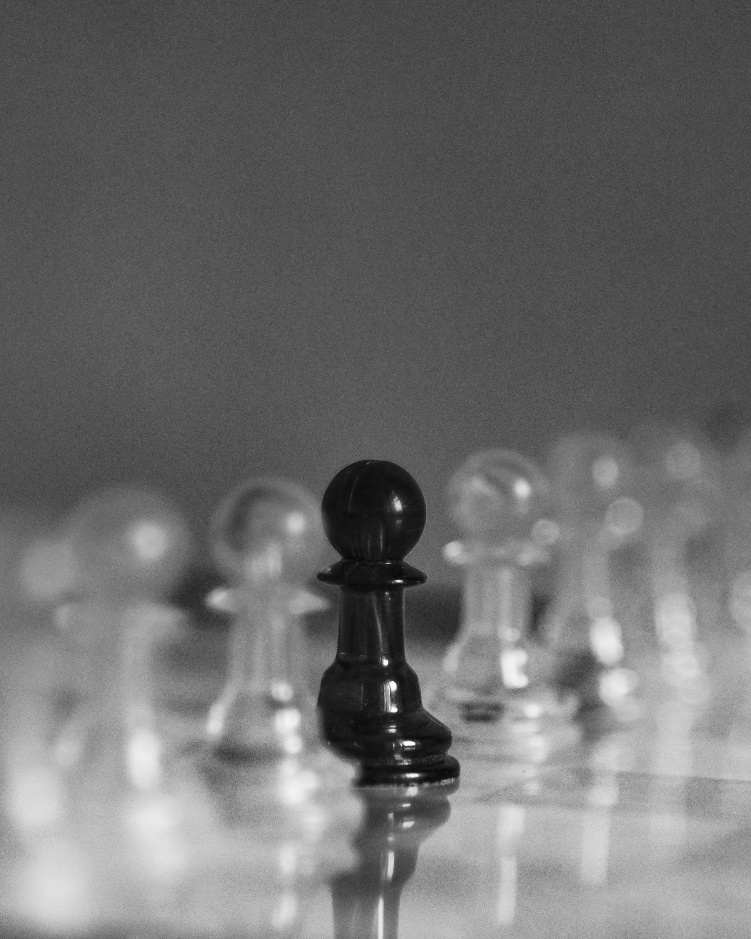 Photo by [Rishabh Dharmani](https://unsplash.com/@rishabhdharmani) on [Unsplash](https://unsplash.com/photos/a-black-and-white-photo-of-a-chess-board-0inyFl3j_rc)
