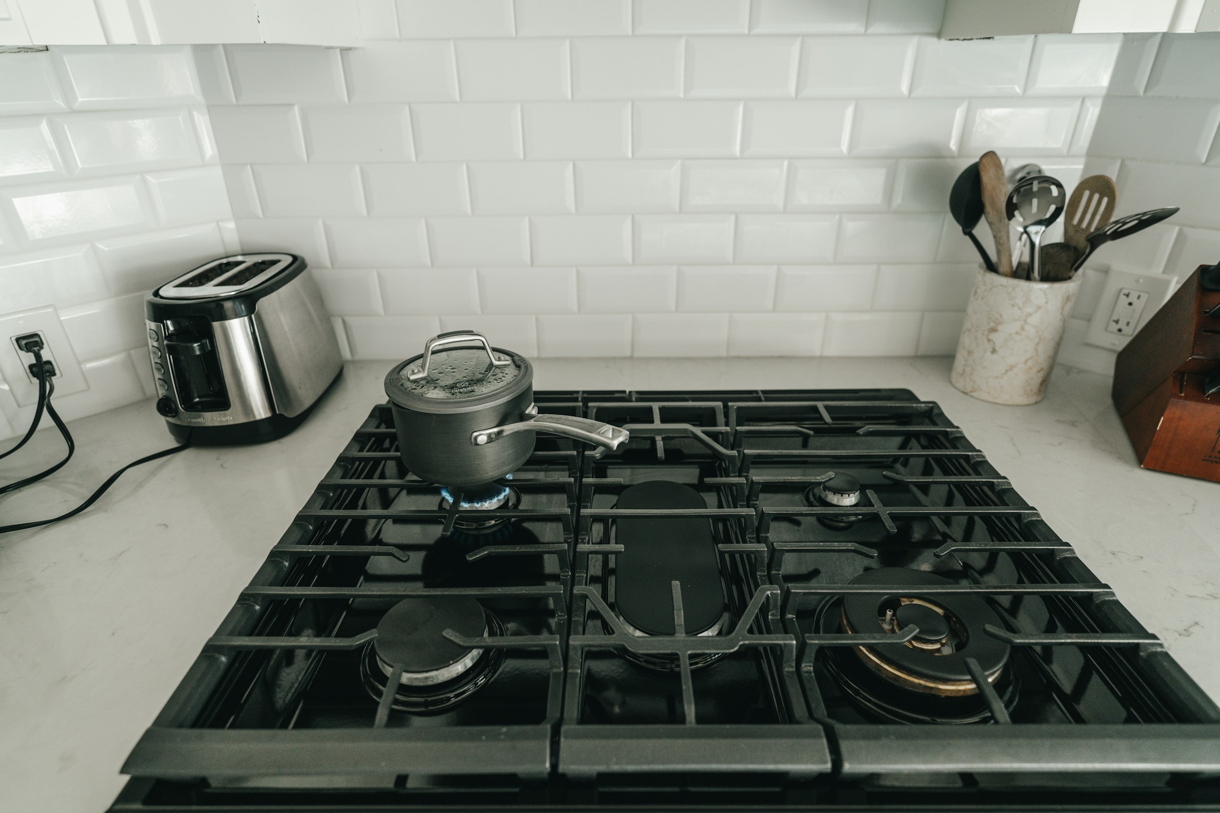 Photo by [Henry Kobutra](https://unsplash.com/@henrykobutra) on [Unsplash](https://unsplash.com/photos/a-stove-top-with-pots-and-pans-on-it-FHtlbd7nLEQ)